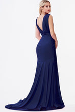 Fitted jersey gown with rouched waistline and pleated deep v-neckline.